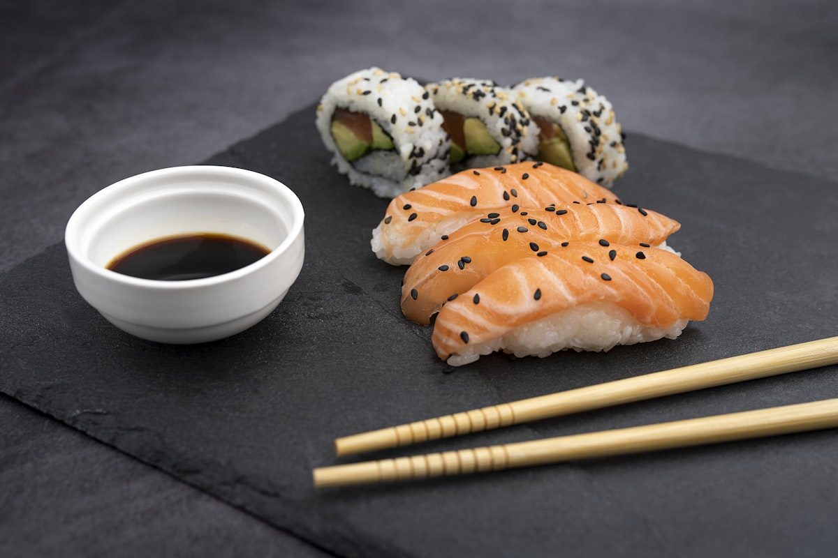 Sushi and sashimi served with soy sauce and sesame, common hidden allergens in Japan