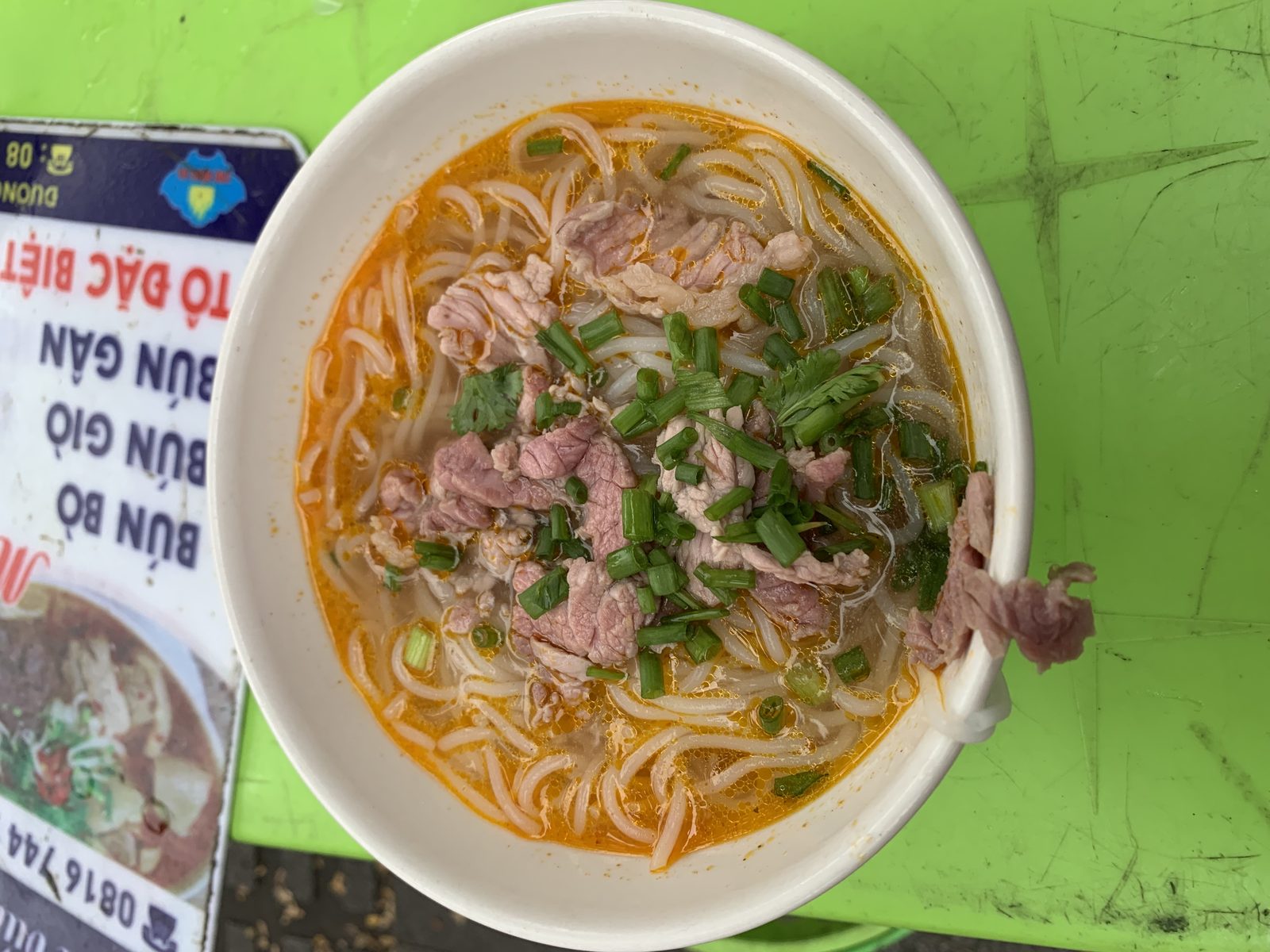 Bun bo hue spicy beef noodle soup Vietnam, rice vermicelli noodles are naturally gluten-free